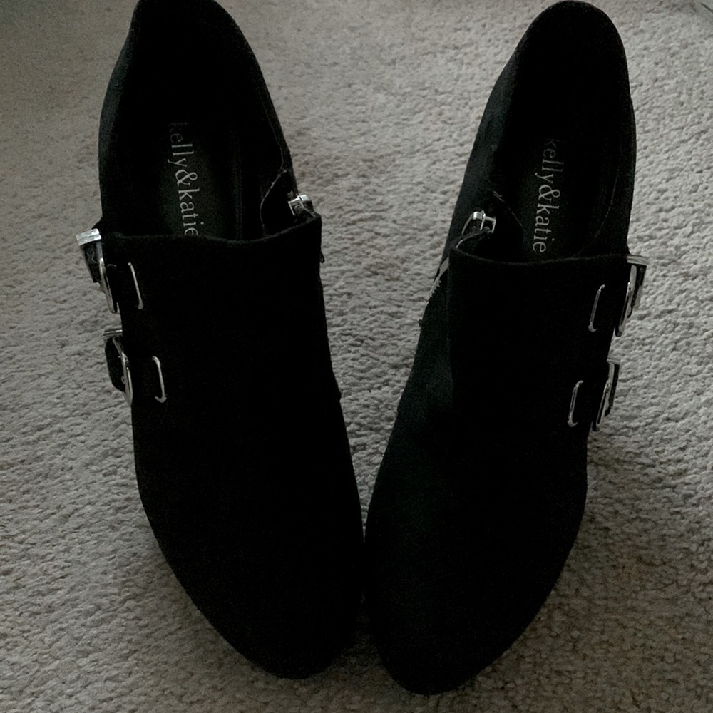 Cute black suede booties.  Brand new, never been worn!